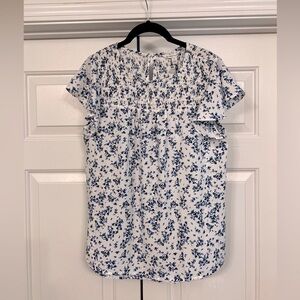 White and blue floral top size medium never worn